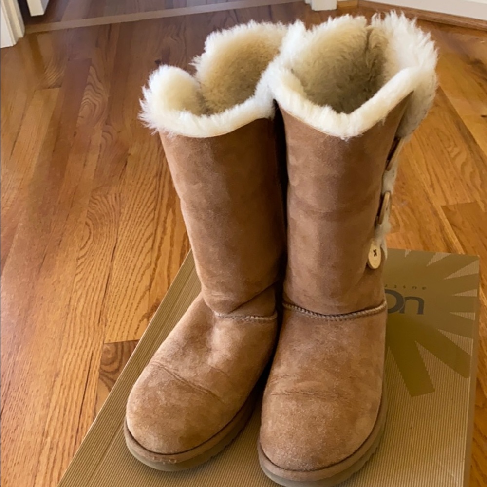 Gently worn tall UGG boots with buttons